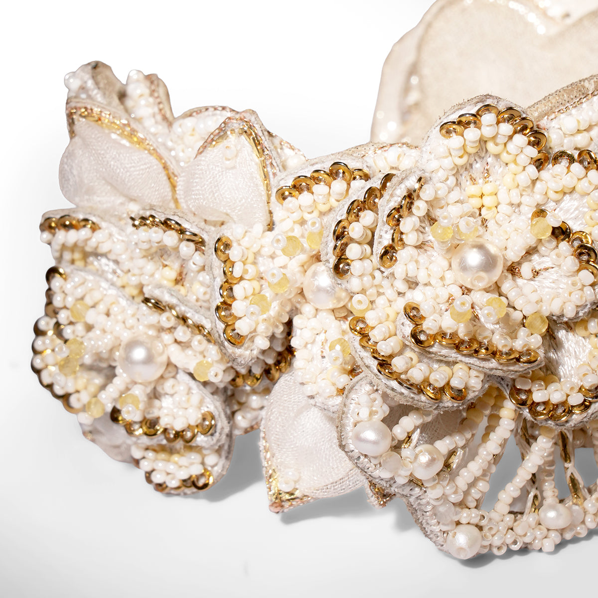 Close up of Deepa Gurnani Padma Cuff in ivory color