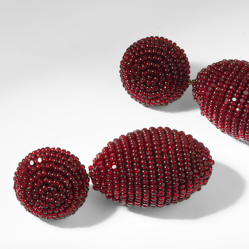 Close up of Deepa Gurnani Lashana Earrings in Maroon