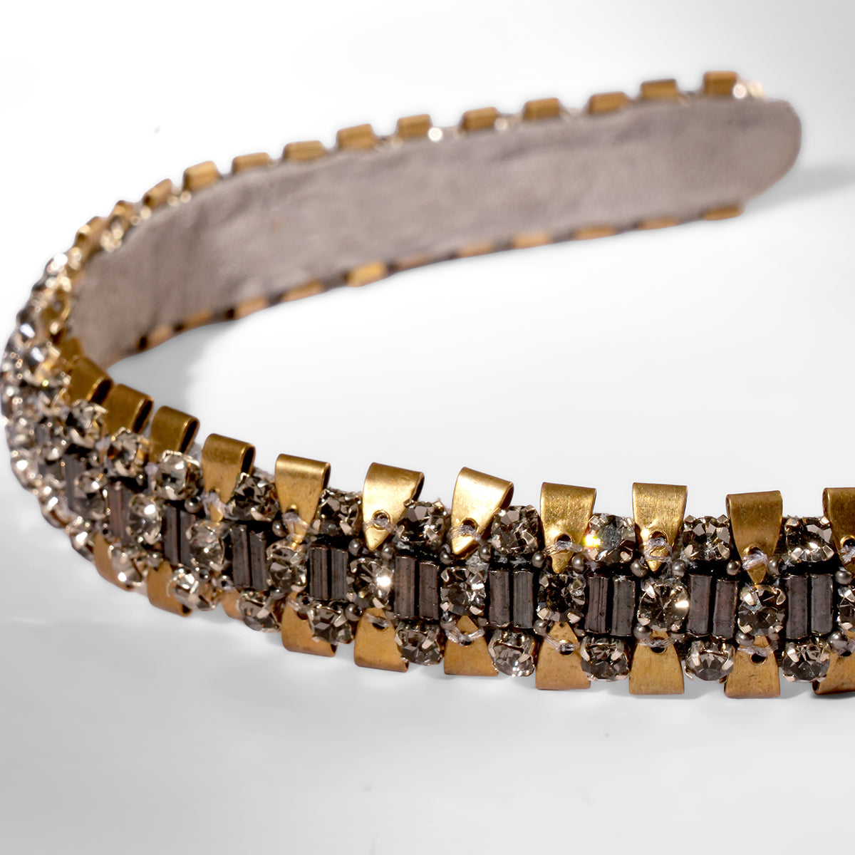 Close up of Deepa Gurnani Pret Villard Headband in gunmetal color