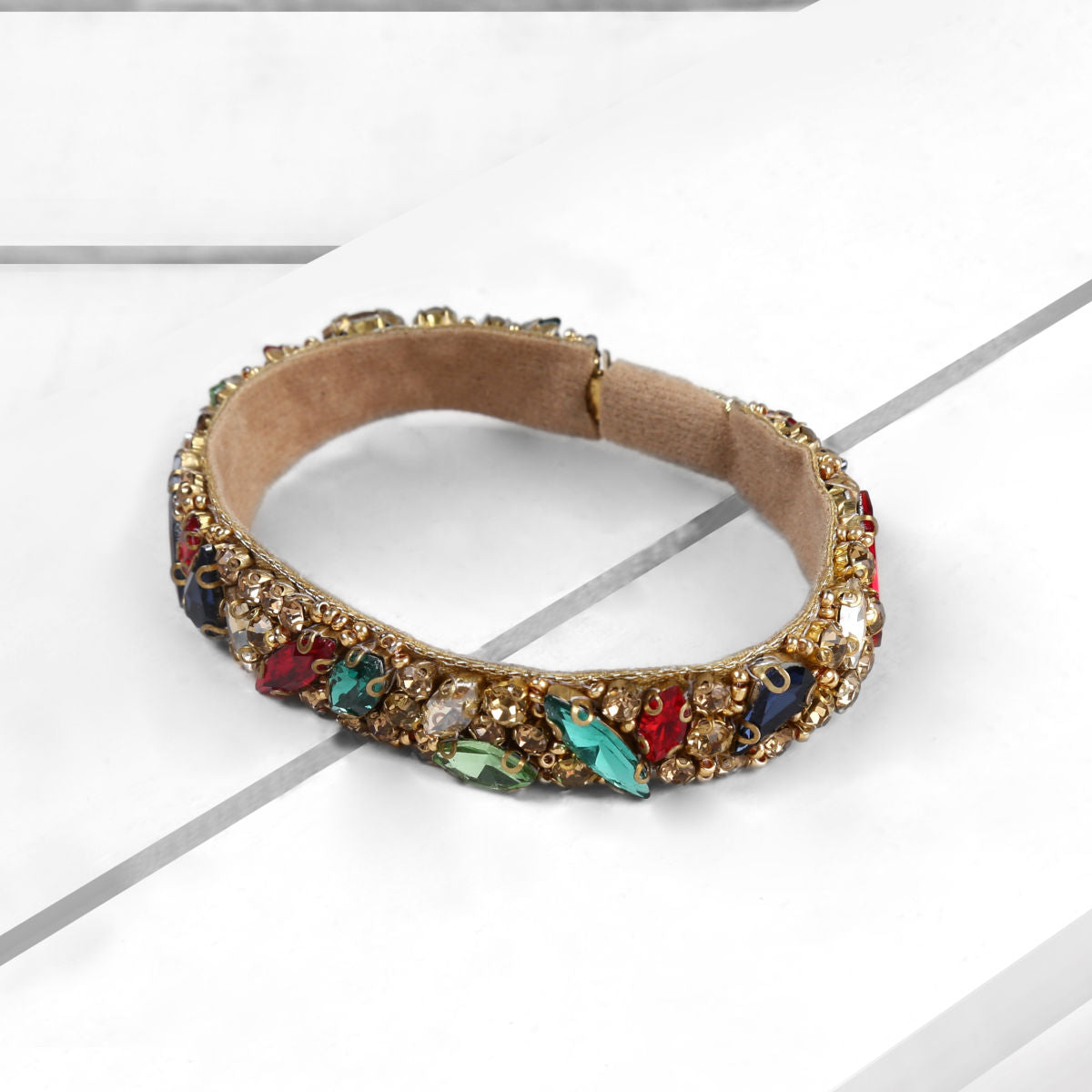 Deepa by Deepa Gurnani Handmade Avalon Cuff Multi Color on Wood Background