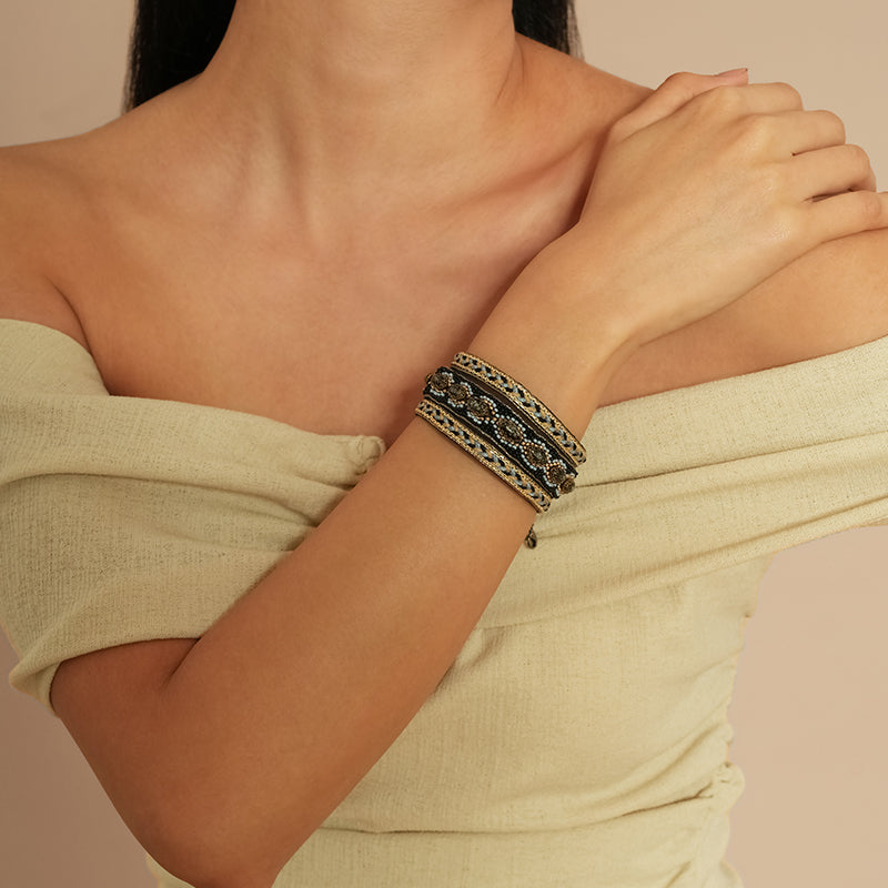 Model wearing Deepa Gurnani Pret Tanner Bracelet in Powder Blue