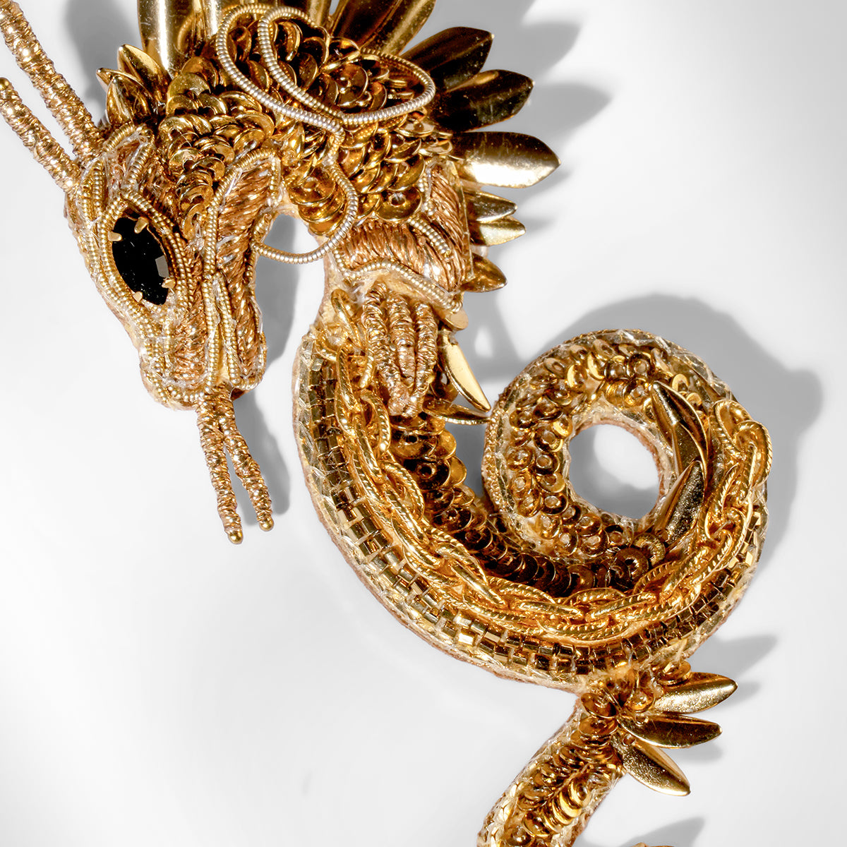 Close up of Deepa Gurnani Dragon Brooch 