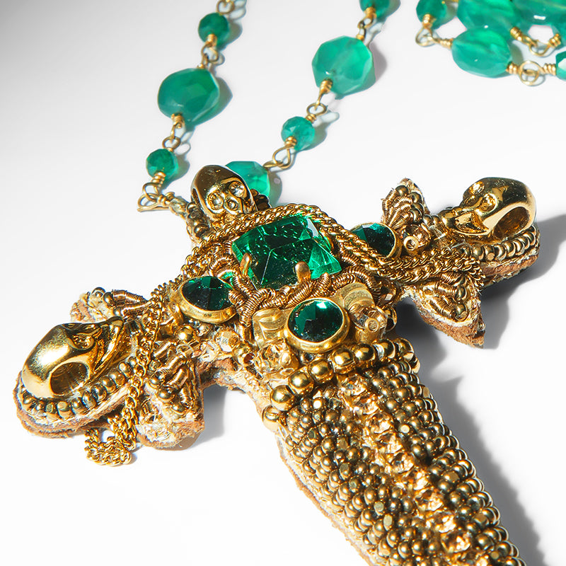Close up of Deepa Gurnani Dagger Necklace in Emerald color