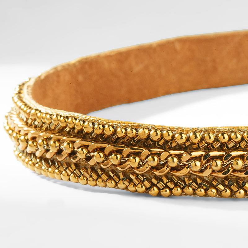 Close up of Deepa Gurnani Pret Maran Headband in Gold