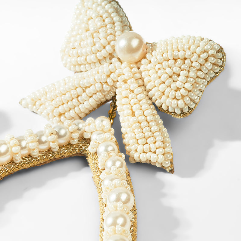 Close up of Deepa Gurnani Darana Earrings in Ivory