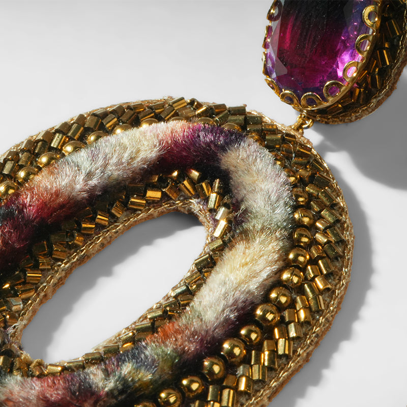 Close up of Deepa Gurnani Pret Ryon Earrings in Purple