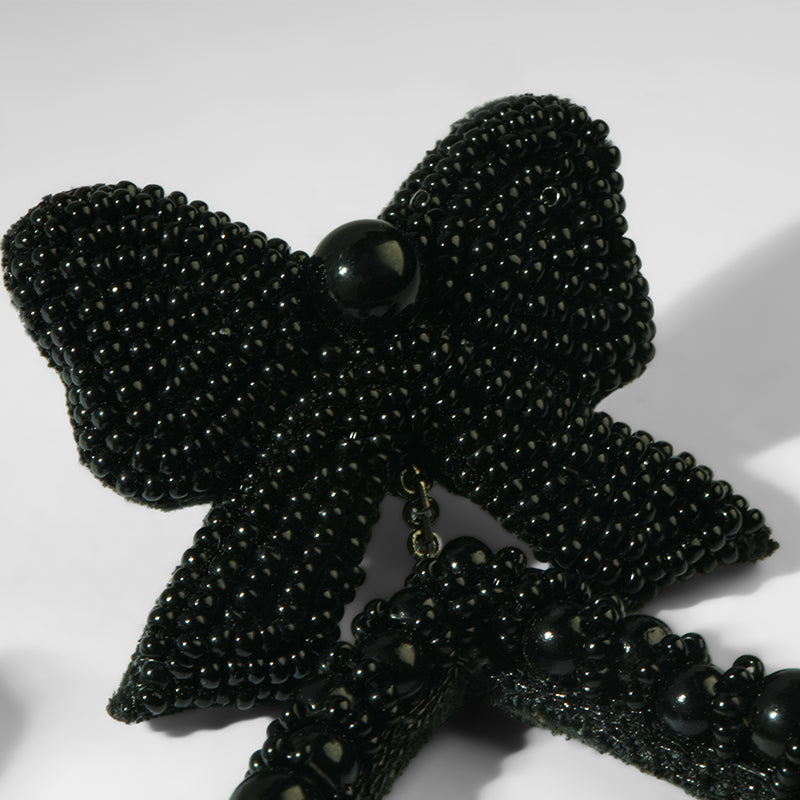 Close up of Deepa Gurnani Pret Darana Earrings in black 