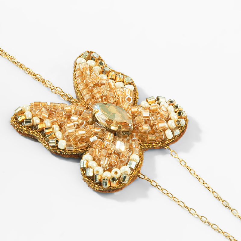 Close up of Deepa Gurnani Pret Lyster Hand Chain 