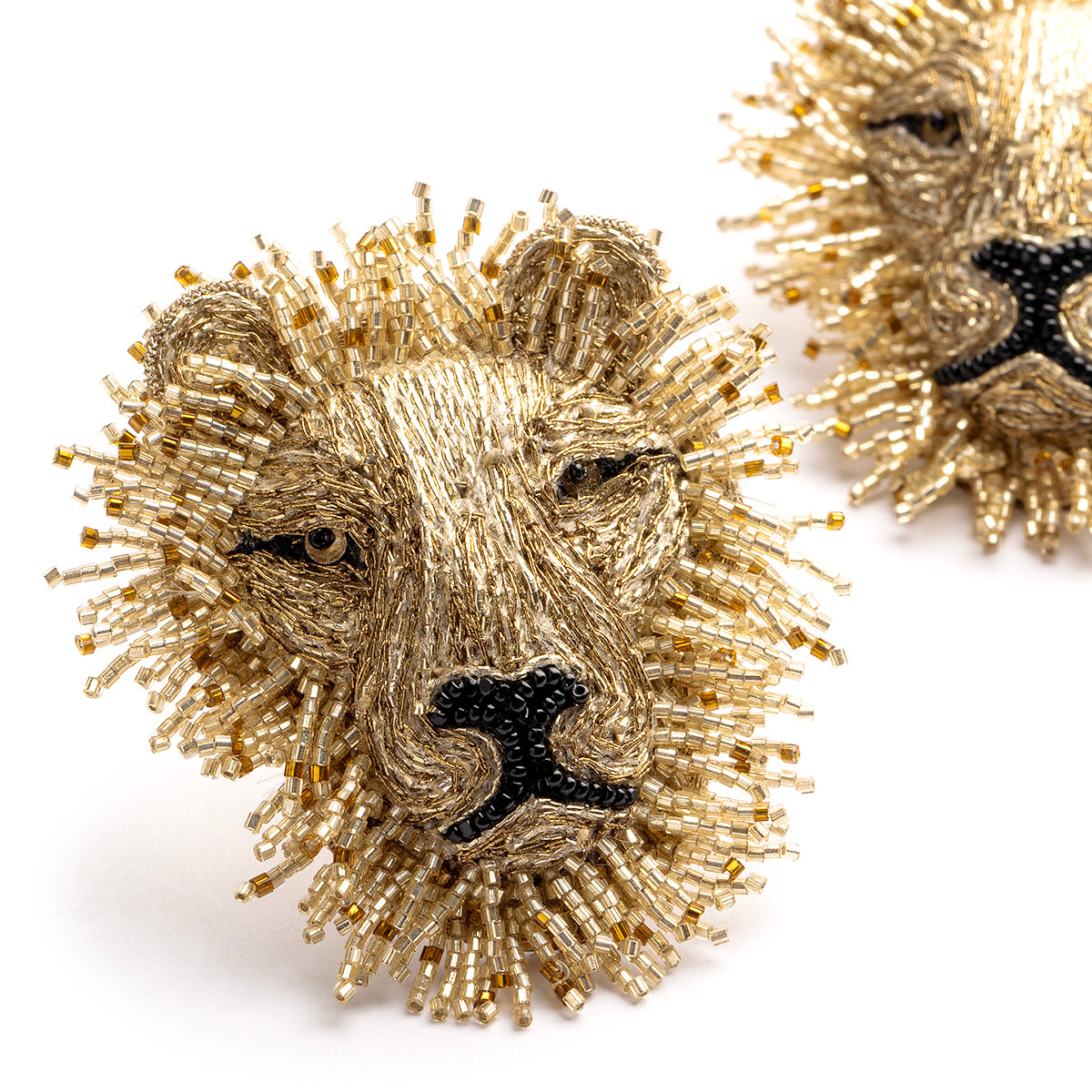 Deepa Gurnani handmade the Lion earrings in gold color