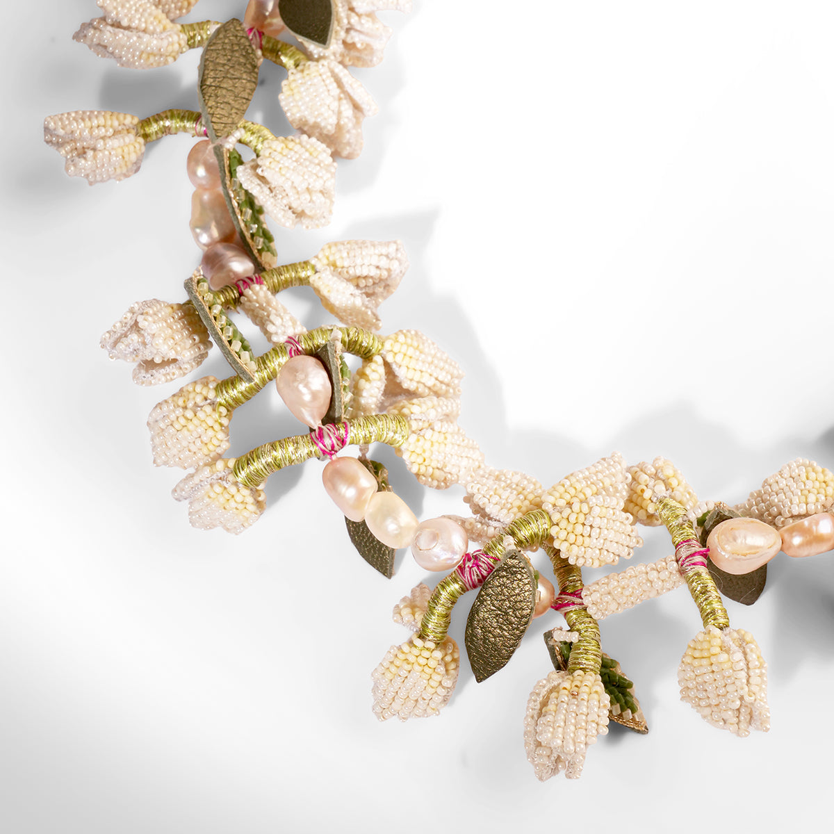 Close up of Deepa Gurnani Handmade Irena Necklace in ivory color