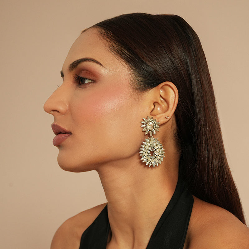 Model wearing Deepa Gurnani Pret Pia Earrings in Silver