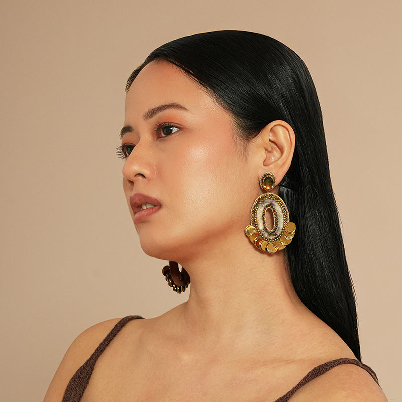 Model wearing Deepa Gurnani Ryon Earrings in Ivory 