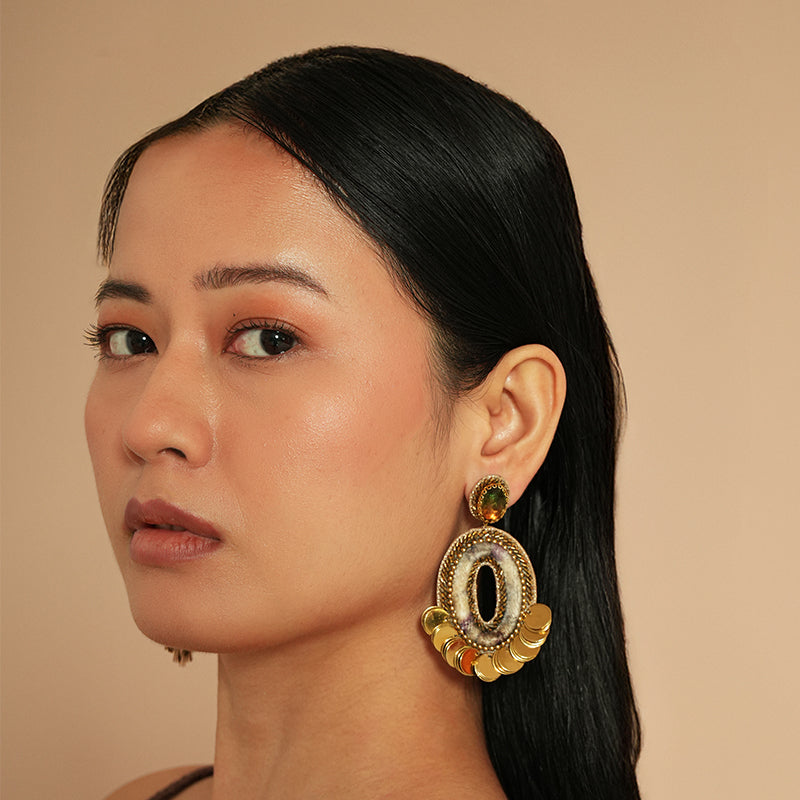 Close up of model wearing Deepa Gurnani Ryon Earrings in Ivory