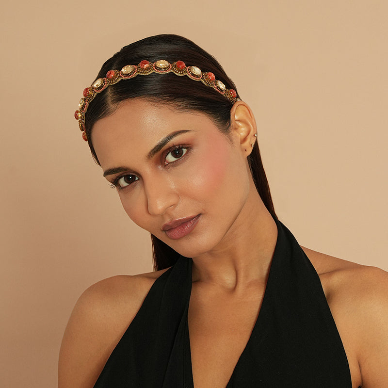 Model wearing Deepa Gurnani Pret Zenia Headband in Coral 