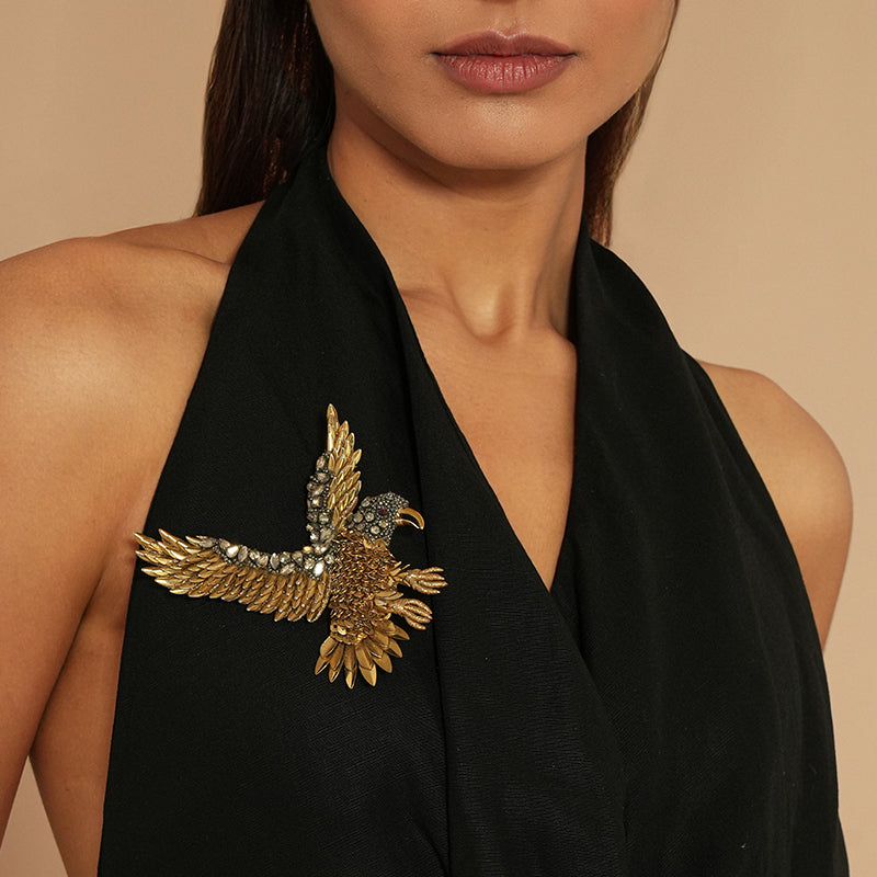 Model wearing Deepa Gurnani Eagle Brooch 