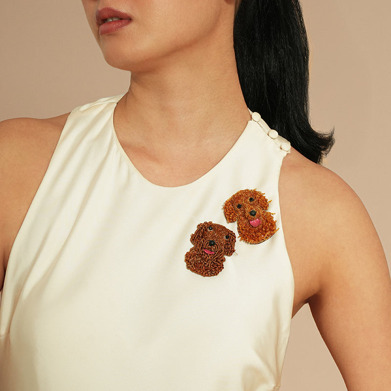 Model wearing Deepa Gurnani Goldendoodle Brooch 