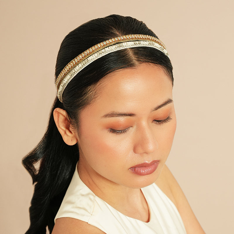 Model wearing Deepa Gurnani Arda Headband in gold 