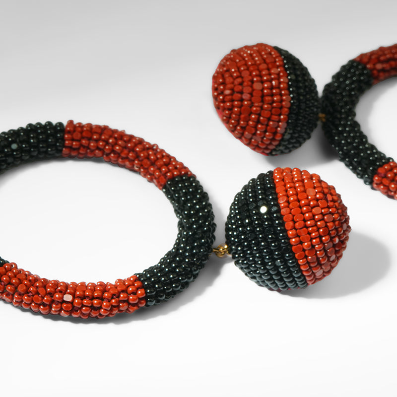 Close up of Deepa Gurnani Tavara Earrings in Maroon 