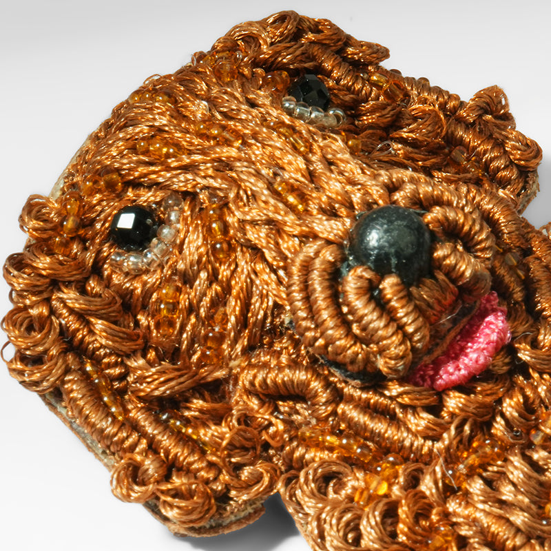 Close up of Deepa Gurnani Goldendoodle Brooch 