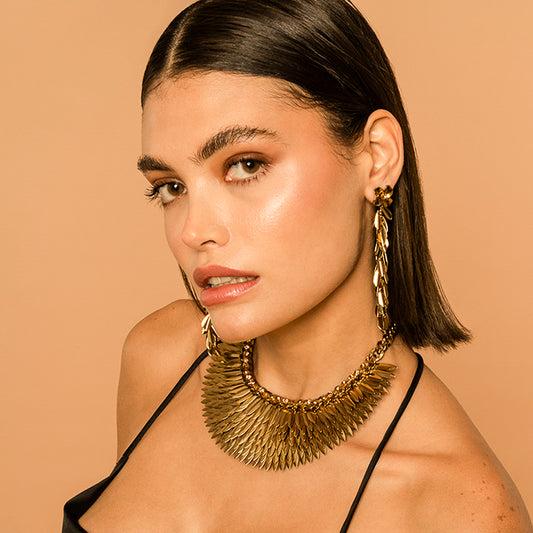 Model wearing our Deepa by Deepa Gurnani Handmade Demeter Earrings in Gold Color