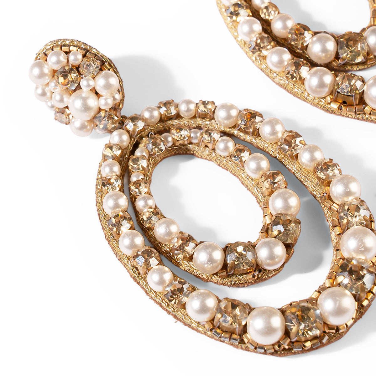Close up of Deepa Gurnani Pret Spencer Earrings in Gold color