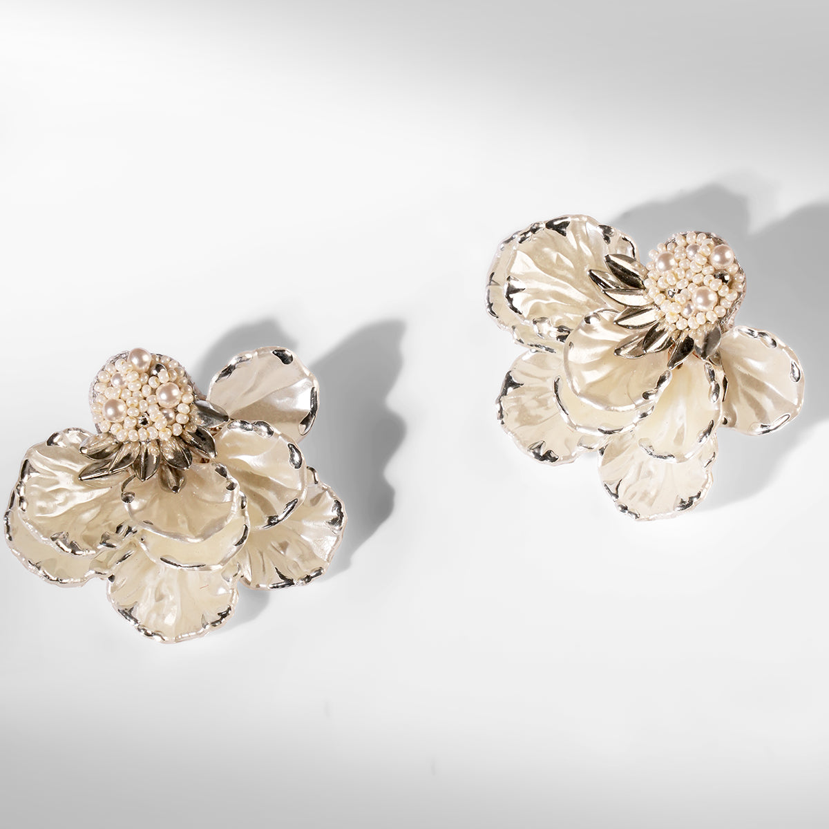 Deepa Gurnani Pret Wally Earrings in silver color 