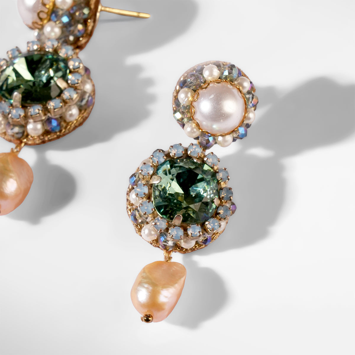 Close up of Deepa Gurnani Pret Mukta Earrings in green color