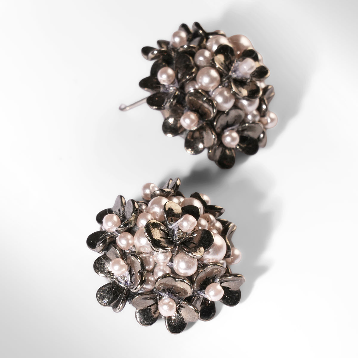 Close up of Deepa Gurnani Pret Kamar Earrings in gunmetal color 
