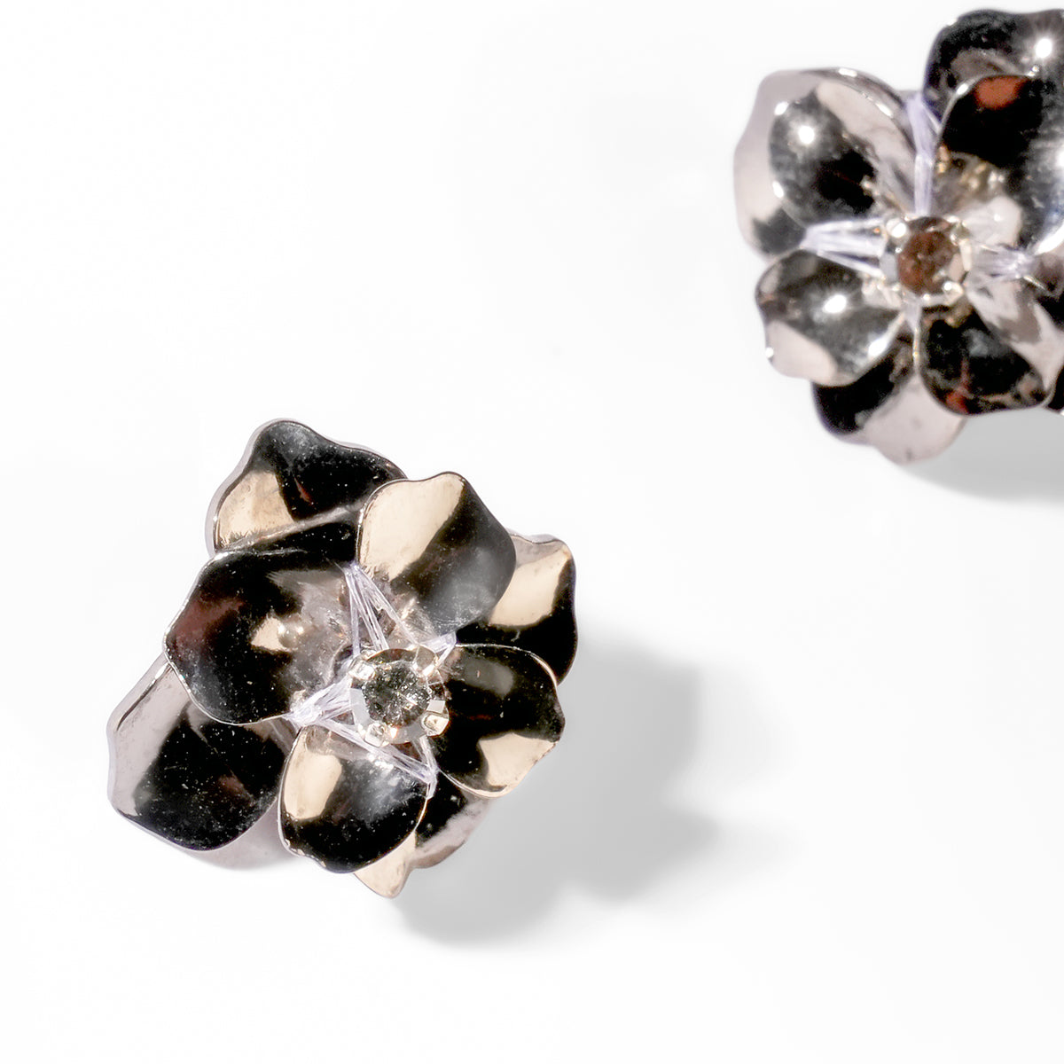 Close up of Deepa Gurnani Pret Siran Earrings in gunmetal color