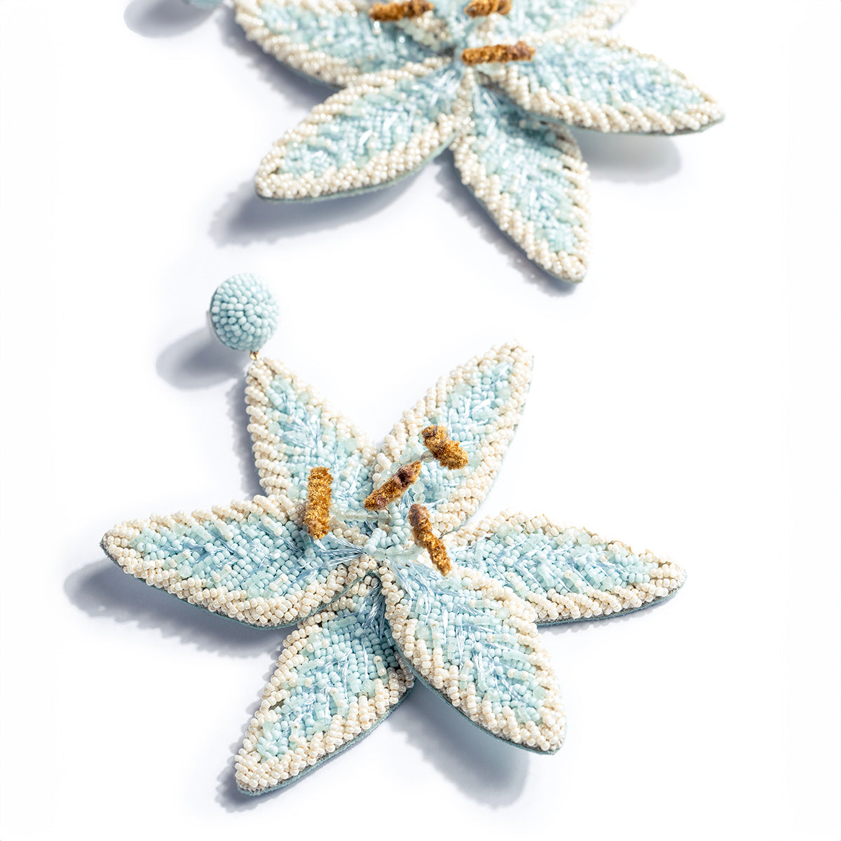 Deepa Gurnani handmade the Palesa earrings in baby blue color