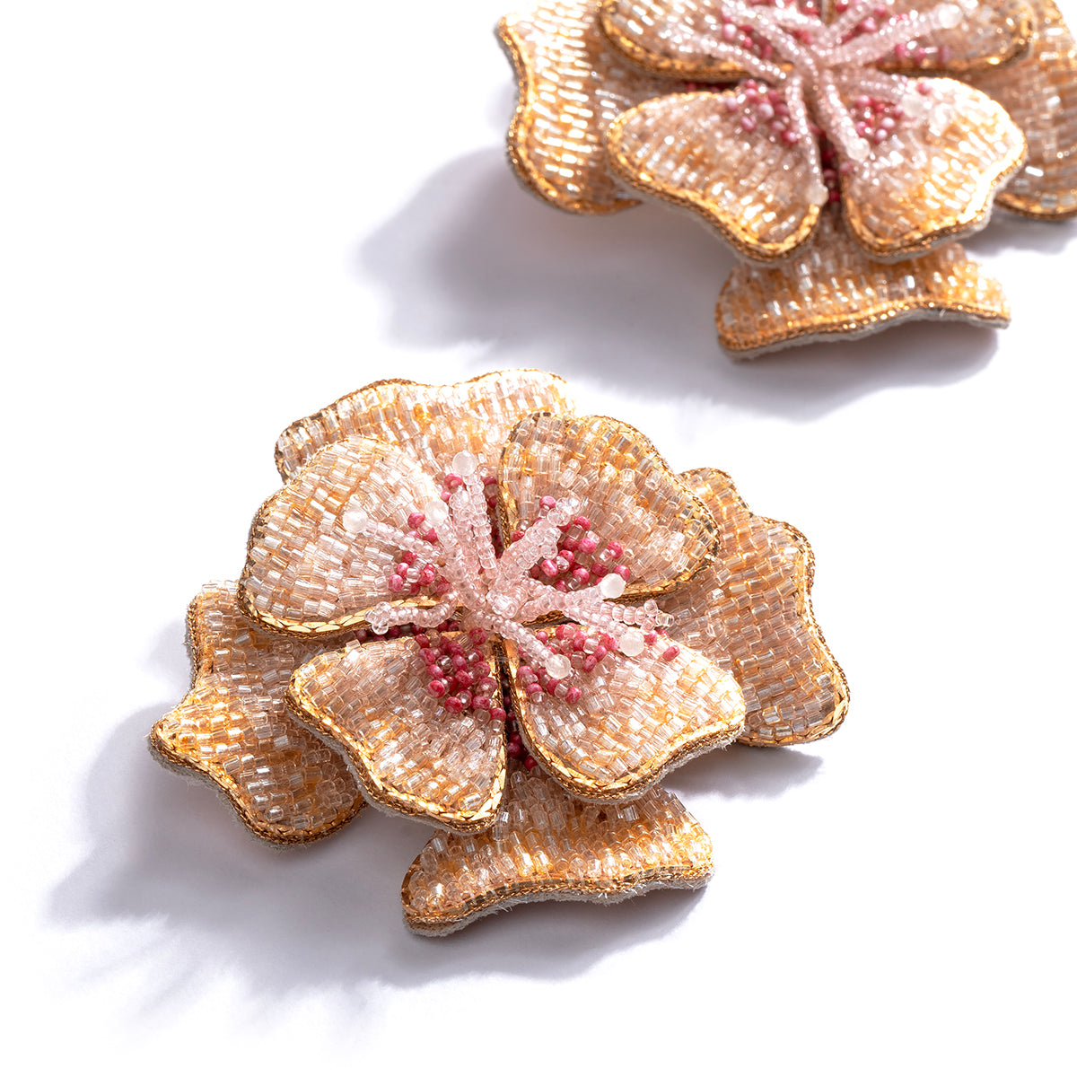 Deepa Gurnani handmade the Mazee earrings in baby pink color