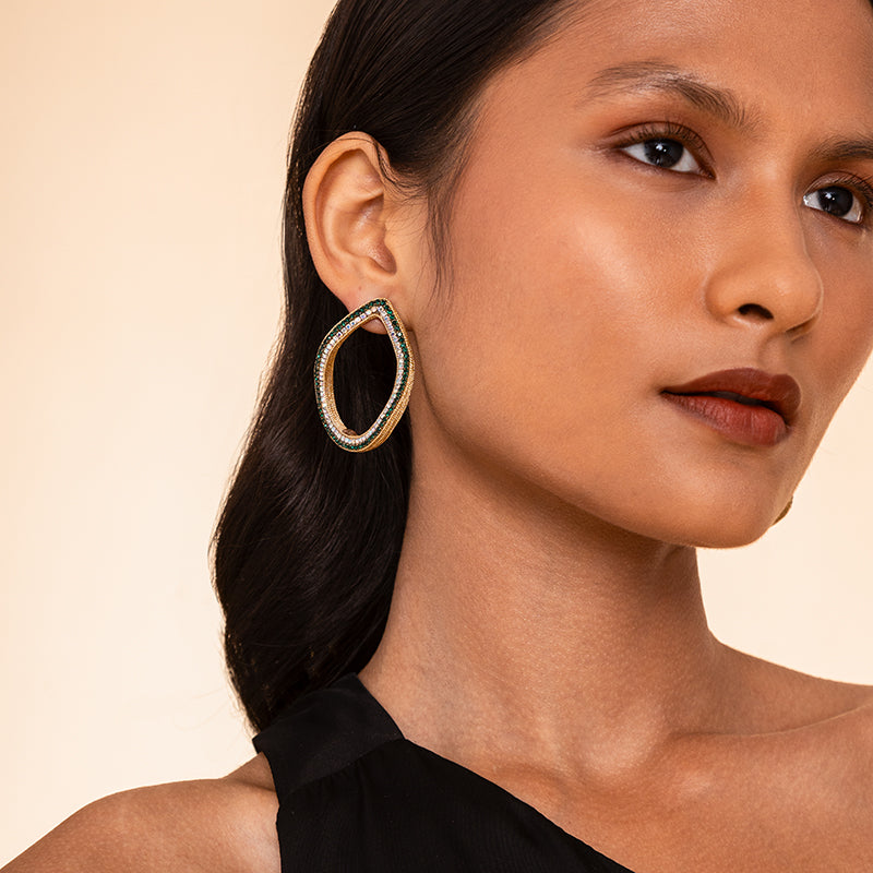 Model wearing Deepa Gurnani Handmade Eve Earrings in green color