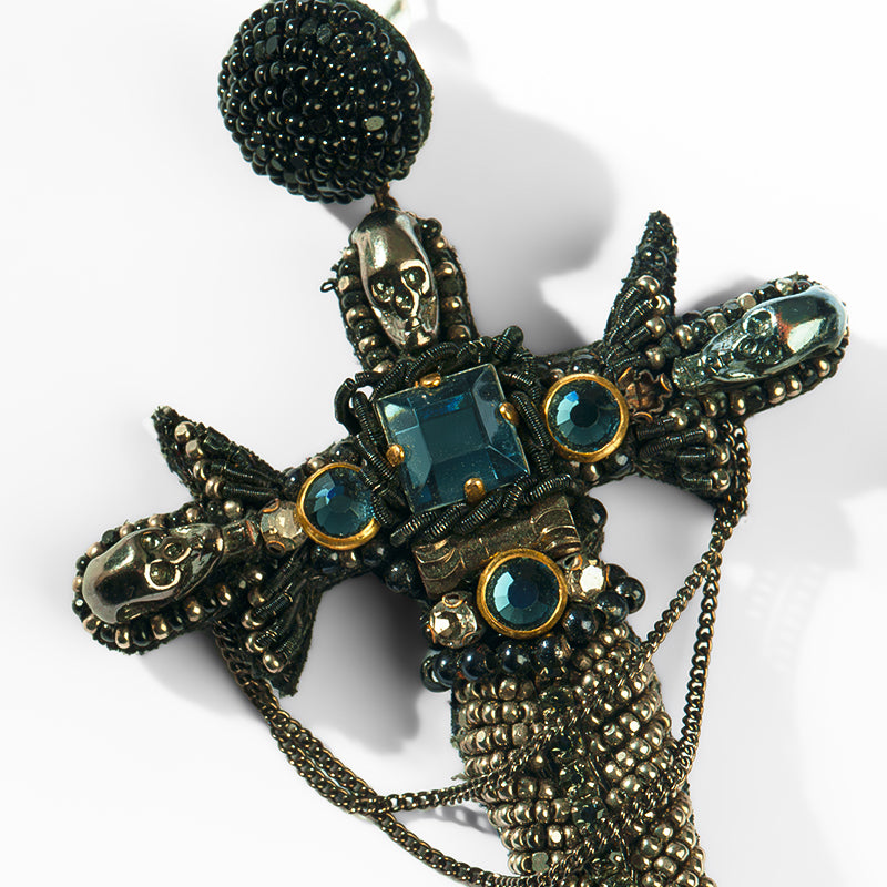 Close up of Deepa Gurnani Dagger Earrings in Gunmetal 