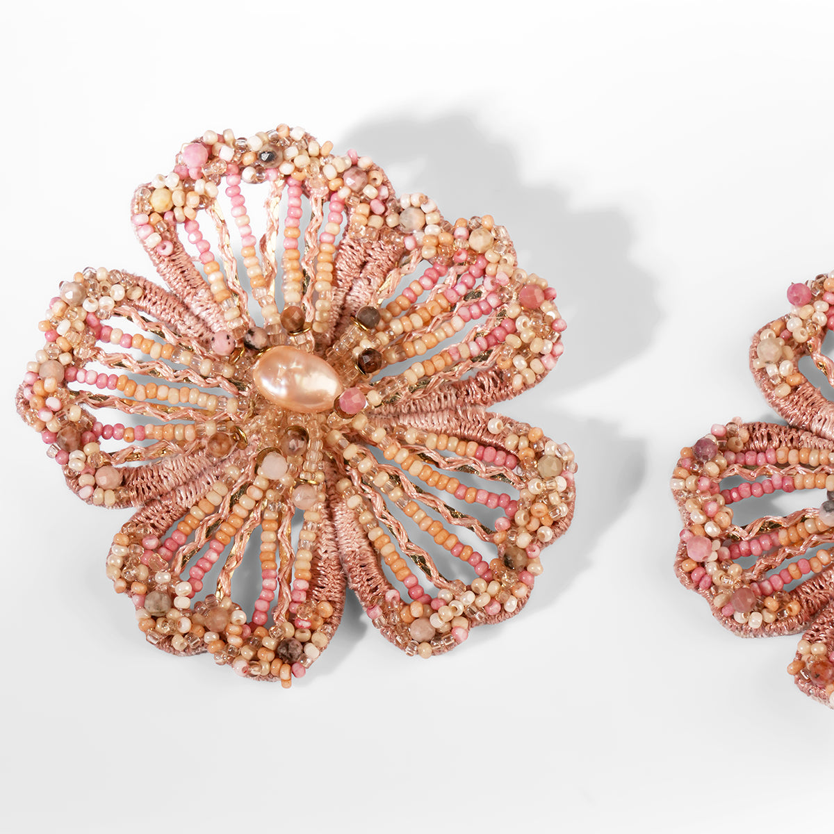 Close up of Deepa Gurnani Gregoriana Earrings in Dusty Pink color
