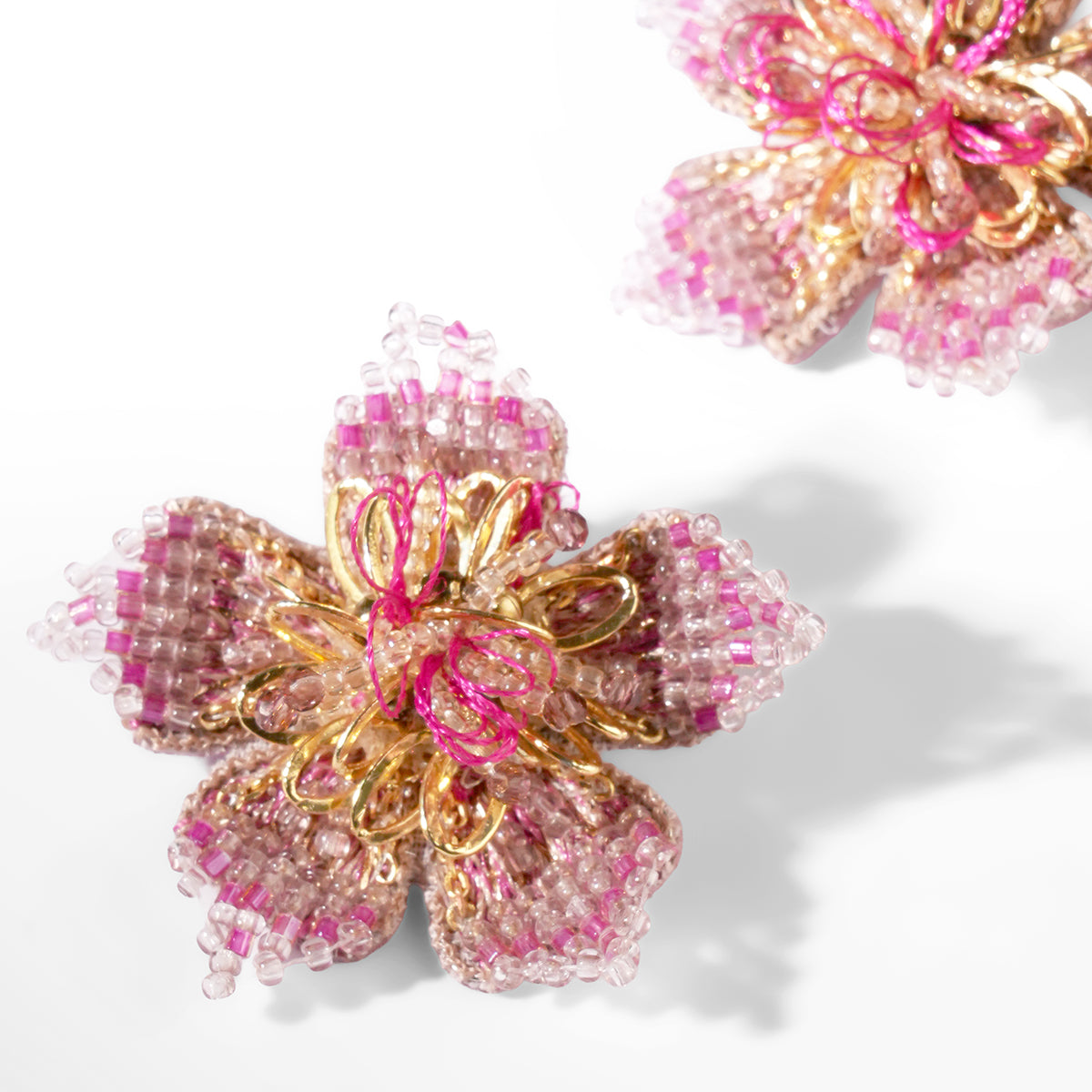 Close up of Deepa Gurnani Adva Earrings in pink color