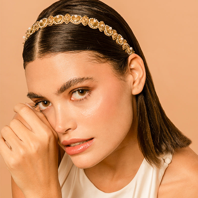 Model wearing our Deepa by Deepa Gurnani Handmade Eunice Headband in gold color