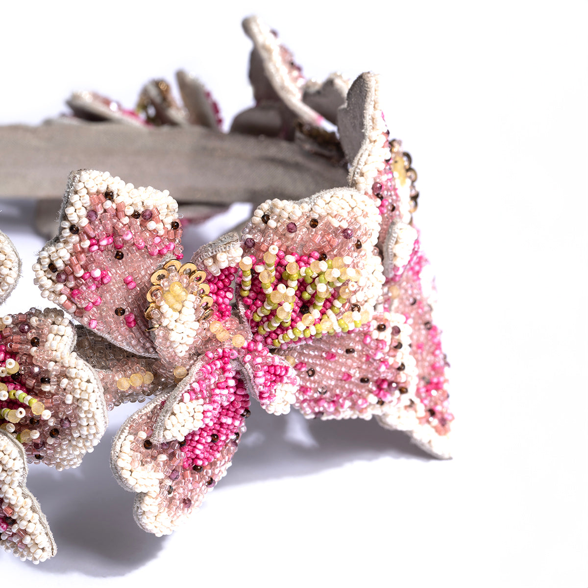 Detail of Deepa Gurnani handmade the Mercer headband in fuchsia color
