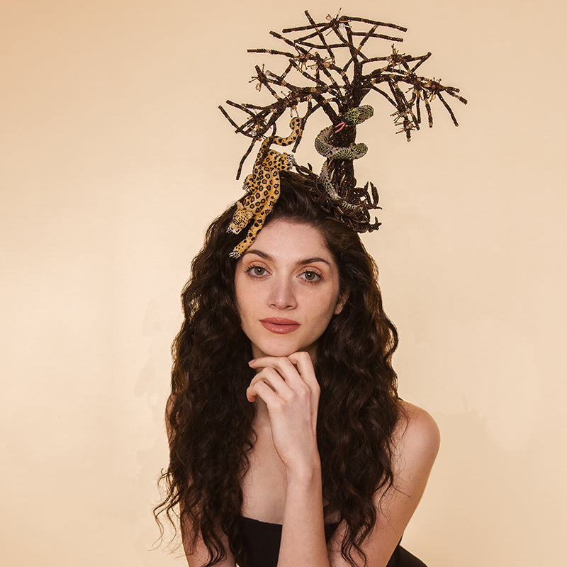 Model wearing Deepa Gurnani handmade the Xander headband in brown color