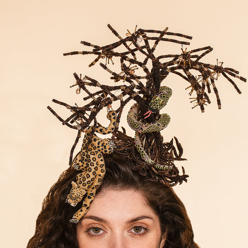 Detail of Model wearing Deepa Gurnani handmade the Xander headband in brown color
