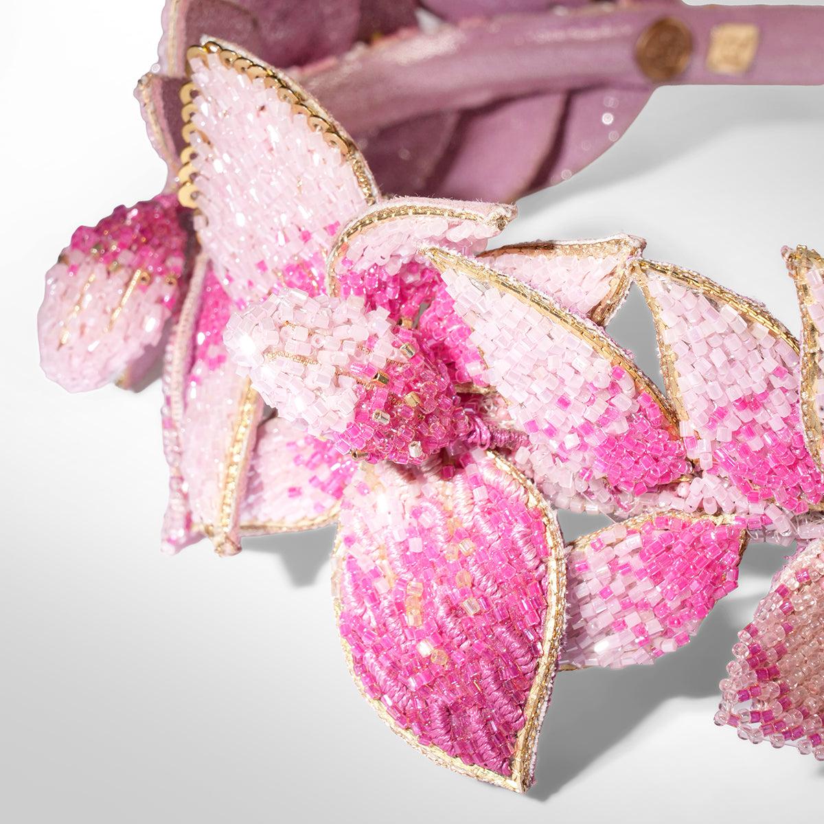 Close up of Deepa Gurnani Cornelia Headband in pink color