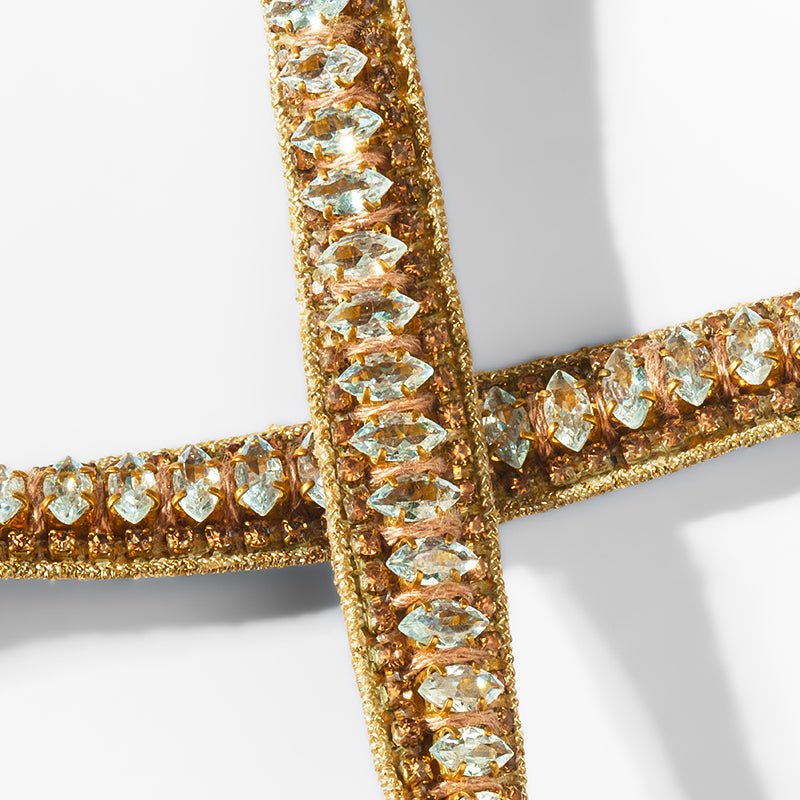 Close up of  Deepa Gurnani Arda Headband in gold 